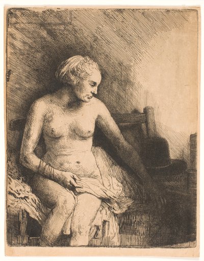 Nő a fürdőben, kalappal mellette alkotó: Rembrandt van Rijn