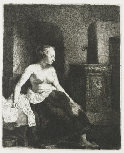 Nő félig felöltözve ül a tűzhely mellett alkotó: Rembrandt van Rijn