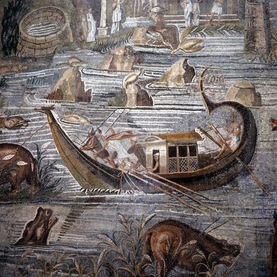 Kr.e. 1. századi folyami hajó. Palesztina mozaikjának részlete. A kormánylapát a tatban és kettős. Ez a mozaik a Szerencse templomából származik, és jelenleg a Barberini-palotában őrzik. alkotó: Roman