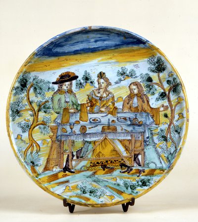 Egy szabadtéri bankett ábrázolása a talavera de la reina (Spanyolország) kerámia tányérján. 16. század eleje. Milánó, Museo del Castello. alkotó: Spanish School