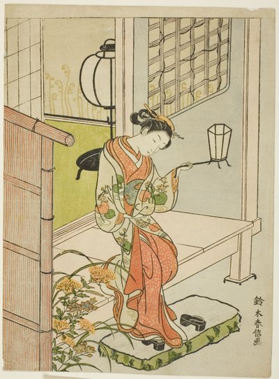 Nő kilép egy lámpással alkotó: Suzuki Harunobu