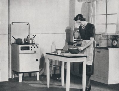 Szekrényes gáztűzhellyel felszerelt brit konyha, 1942. alkotó: Unbekannt