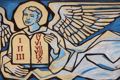 Festmény a togói Boldogasszony-templomban: Angyal a törvény asztalait tartja, Togoville, Togo alkotó: Unbekannt
