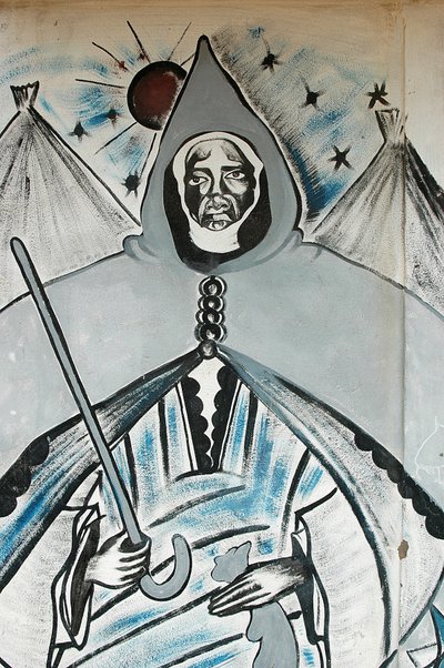 Falfestmény, amely egy muszlim spirituális vezetőt ábrázol, Dakar, Szenegál alkotó: Unbekannt