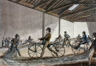 A manézs belső nézete Hobby ló számára. Férfi kerékpárt vezet (a pedál nélküli kerékpárokat Karl Drais báró találta fel alkotó: Unknown artist