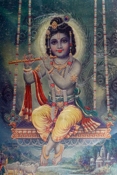 Lord Krishna fuvolával. Hindu Isten. alkotó: . .