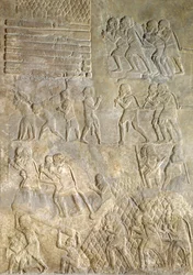 Dombormű, amely hordárokat ábrázol, akik fát szállítanak a tengerpartra tengeri szállítás céljából. a Sargon II palotából, Khorsabad, Irak