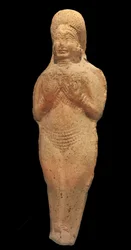 Meztelen nő figurája. Terrakotta, Babilon, Kr. e. 2. évezred. Musée de la Castre, Cannes.