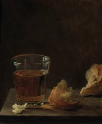 Egy pohár sör és egy zsemle az asztalon