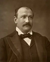 Augustus Harris brit színész az Emberi természetben, 1886