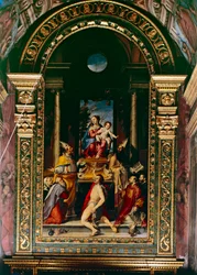 Madonna és a Szent Antal gyermeke trónol (olaj a panelen)