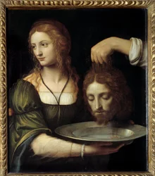 Salome átveszi Keresztelő Szent János fejét. Saloménak tálcán nyújtják át Keresztelő Szent János lefejezett fejét, amelyet Heródes Antipász és Heródiás lakomáján követelt. Bernardino de Scapis, más néven Bernardino Luini festménye