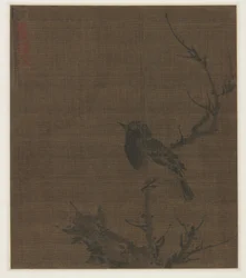 Alvó madár a Prunus ágon