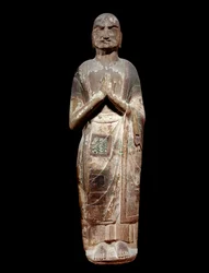 Kínai művészet: Buddha szerzetes tanítványát, kasjapát ábrázoló szobor. Sui-dinasztia (i.sz. 581-618). Párizs, Guimet Múzeum, Ázsiai Művészeti Múzeum.