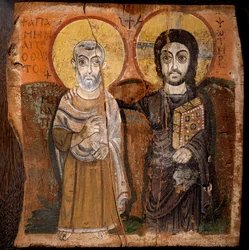 Kopt művészet: „Krisztus és Mena apát” Saint Menas (Minas, Mina, Mena, Mennas), a 3. század egyiptomi vértanúja. 6. vagy 7. századi fafestéktöredék (fügefán detrempe) Mérete: 57x57cm. Az egyiptomi Baouit lelőhelyről. - Kopt művészet: „” Chri