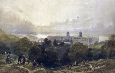 Greenwich (Anglia) látképe, egy nyári estén, a park magaslatáról, hátulról a londoni égbolt.