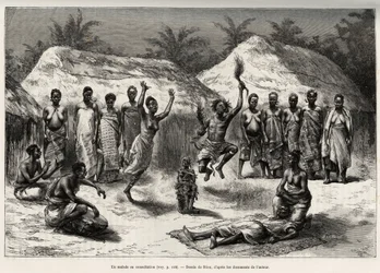 A páciens az agnival (vagy anyival, Elefántcsontparton) egyeztetve táncol a varázslóorvos, miután fetiche-t helyez a beteg elé. Riou metszet, Louis Gu kapitány „"Nigertől a Guineai-öbölig" című történetének illusztrálására