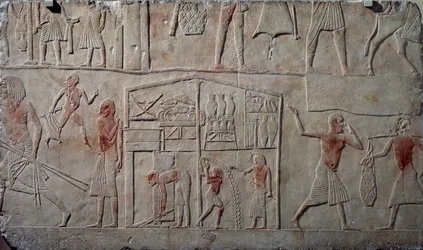 Élelmiszerek elhelyezése a raktárakban, mészkő faldombormű, Horemheb memfita sírjából Szakkarában, Egyiptomi civilizáció, Újbirodalom, XVIII. dinasztia