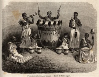 Az udvari zenekar a Karague-ban (a Victoria-tótól nyugatra, a mai Zimbabwe), Emile Bayard (1837-1891) rajza, Speke kapitány afrikai felfedezőútja 1860 és 1863 között. Gravírozás: „” Le tour du monde ””, szerkesztette Edouard Char