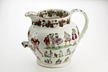 Harlekin figurákkal és karneváli témával díszített Staffordshire kancsó, 1866 (vaskő Kína)
