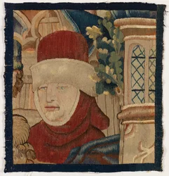 Small fragment of tapestry depicting the head of a man, late 15th century (wool)