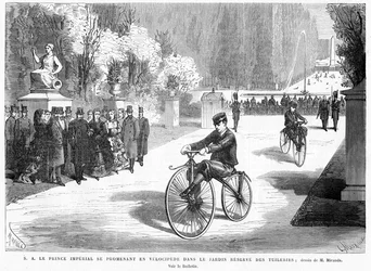 A császári herceg, akit szülei, a császár és a császárné néztek, megmutatja tudását egy Michaux velocipéddal a Tuileries Gardensben, Párizsban, 1869