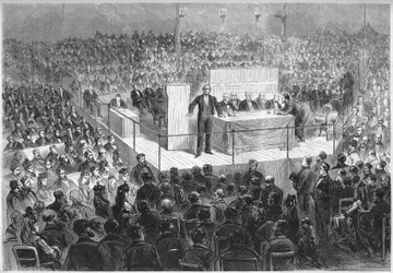Ernest Legouve (1807-1903) író elnököl egy „hazafias találkozón”, amelyet azért szerveztek, hogy pénzt gyűjtsenek a Németország által az 1870-es háború vége óta megszállt francia megyék megváltására. Párizs, a Champs Elysees cirkusza, február 25.