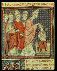 142r fólió: Jámbor Lajos (778-840) német-római császár megkoronázása IV. István pápa (pápa 816-817) által Reimsben 816-ban, a Grandes Chroniques de France című műből, 1375-79