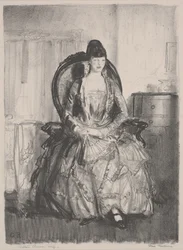 Emma egy székben