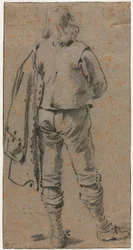 Egy férfi áll hátulról nézve