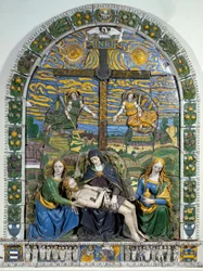 Levétel a keresztről (Pietà). Jézus Krisztus és Szűz Mária Szent János és Szent Mária Magdolna körében, az INRI (I.N.R.I.) feliratú kereszt előtt. Giovanni della Robbia (1469-1529) kerámia domborműve. Mérete 3 x 2,28 m, Firenze, Museo Nazionale