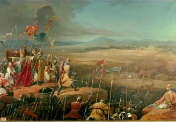 Első keresztes hadjárat: Antiochia falai alatt vívott csata Bohemond (Tarentói Bohemond vagy Hauteville-i Bohemond vagy Nagy Antiochiai I. Bohemond, 1054-1111) által vezetett keresztesek és Karbouka (= Kerbogha, 1102-ben halt meg), a szultán tábornokának
