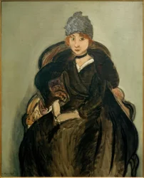 Margit kék kalapban