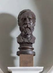 John D. Sedding mellszobra, 1886-87 körül