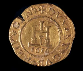 A Gének Köztársaság pénzneme: egy arany quadrupla genovai portállal. Átmérője 32 mm. 1616. eleje. Genes Musei di Strada Nuova