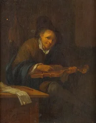 Ember játszik hegedűn