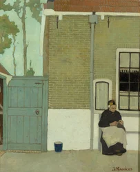 Woman in front of her house