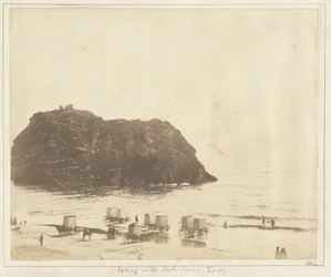 Fürdés a Tenby déli homokon.