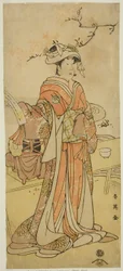 A színész Segawa Kikunojo III mint a női rókatündér Otatsu-gitsune, aki Shizuka Gozennek álcázta magát a Kogane Saku Date no Okida című darabban, amelyet az Ichimura Színházban adtak elő 1792 tizenegyedik hónapjában.