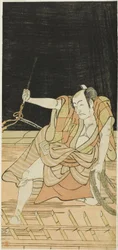 Nakamura Nakazô I. mint Danshichi Kurobei és Ichikawa Danjűrô V. mint Issun Tokubei a "Tükör Oszaka nyári fesztiválján" ("Natsu MatsuriNaniwa Kagami") című filmben.