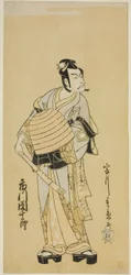 A színész Ichikawa Danjuro V mint Soga no Goro Komusonak álcázva a Sakai-cho Soga Nendaiki című darabban, a Nakamura Színházban az első hónapban, 1771