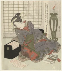Egy gésa támaszkodik a shamisen dobozára