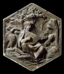 A zene allegóriája, mint orfe Az erdő állatai hallgatják Orphe lantját. Luca della Robbia magas domborműve