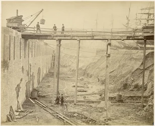A kibővített Limehouse-medence építése, London, 1869. május