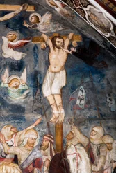 A meg nem tért tolvaj Jézussal együtt feszít, lelkét kitépi a szájából egy démon A gonosz tolvaj ábrázolása Gesmasnak vagy Gestasnak hívja. Freskó a Sacro Speco mesterétől. 14. század. Felsőbbrendű templom. Szent Benedetto kolostor (Sacro Spec