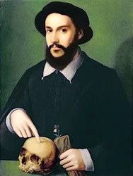 Egy úriember portréja jobb kezével egy koponyára mutat, 1540 körül