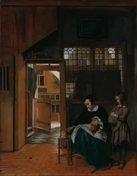 Egy nő kenyeret és vajat készít egy fiúnak, c. 1660