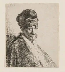 Magas sapkát viselő férfi mellszobra