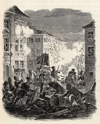 Barikádharc a berlini Cölln városházánál 1848. március 18-ról 19-re virradó éjszaka.