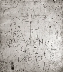 Káromló graffito egy keresztre feszítésről (kő)